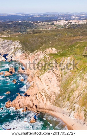 An aerial view of cliffy coastline in Cabo da Roca facing Atlantic Ocean, Colares, Lisbon, Portugal