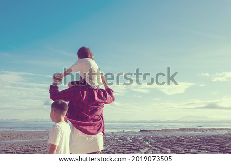 child riding his dad's neck, family time, father's day
