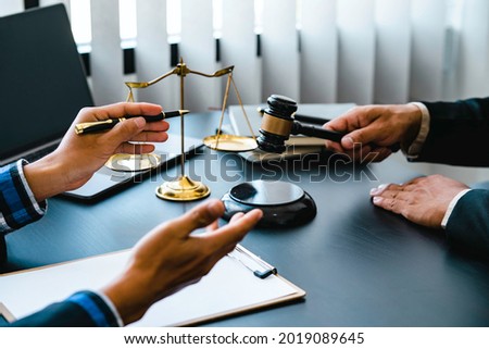 Male Notary lawyer or judge consult or discussing contract papers with Businessman client in office to help their customer, Law and Legal services concept.
