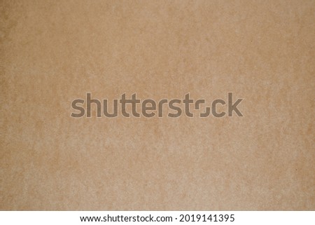 Fiberboard surface.Brown recycled wooden texture. Wooden surface of a fibreboard d sheet, top view. Brown hardboard texture background.