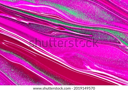 Fluid art texture. Backdrop with abstract swirling paint effect. Liquid acrylic artwork that flows and splashes. Mixed paints for interior poster. Navy blue, golden and azure overflowing colors