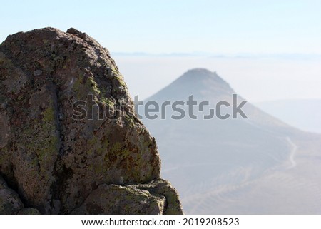Silhouette mountain landscape and rock.
