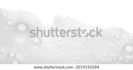 Soap foam or shampoo Soap foam texture or shampoo surface with bubble for white background. White Foam bubble from soap on top view. Royalty-Free Stock Photo #2019210284