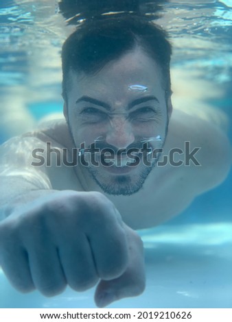a man having fun underwater