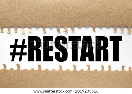 Wooden Blocks with the text: Restart. New business relaunch startup concept.