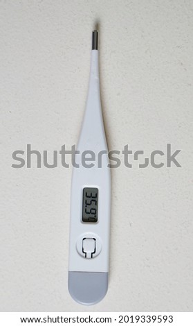 Electronic modern thermometer isolated on white. For measuring body temperatur