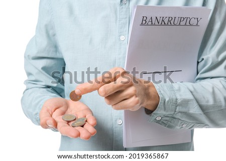 Man with coins on white background, closeup. Bankruptcy concept
