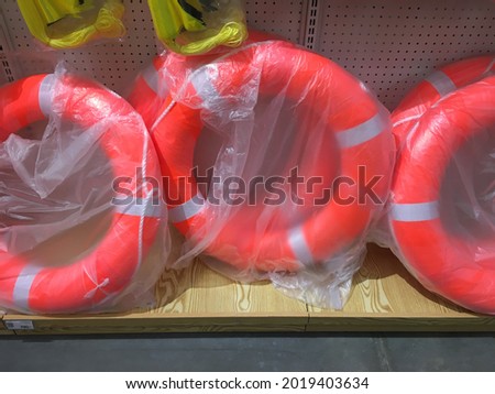 Lifebuoy with rope, lifebuoy on the pier, water emergency rescue equipment. safety first