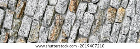 granite wall with visible details. background or texture