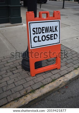 Sidewalk closed orange sign taken on a pavement on July 31, 2021, Chillicothe OH 