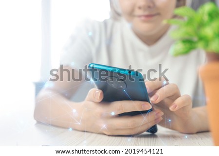 Technologu networking concept, woman holding smartphone with abstract polygonal wireframe, searching for digital innovation background 