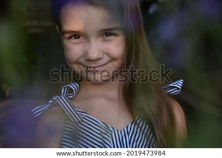 portrait of a little girl who smiles
