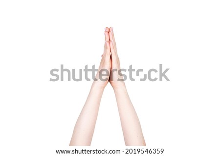 Hands together making prayer sign on white background. Concept of hands and signs. Body language