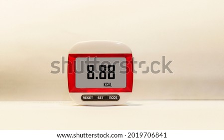 Collorimer on a white background with space for writing and numbers on the display. Place to copy text