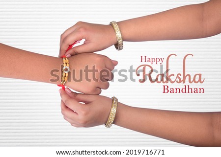 A sister is binding rakhi on her brother hand on the festival of raksha Bandhan, Rakshabandhan
 Royalty-Free Stock Photo #2019716771