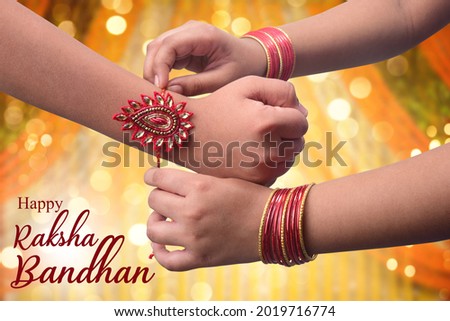 A sister is binding rakhi on her brother hand on the festival of raksha Bandhan, Rakshabandhan
 Royalty-Free Stock Photo #2019716774