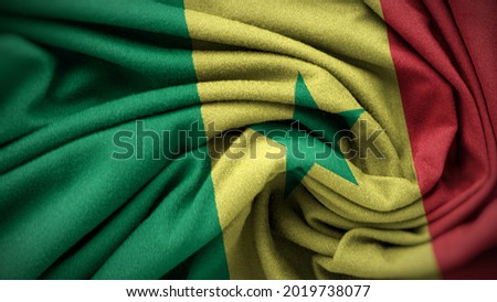 The national flag of Senegal. Senegal flag with fabric texture. Close up waving flag of Senegal.