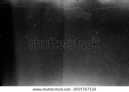 Dusty scratched grunge scanned old film texture Royalty-Free Stock Photo #2019767126