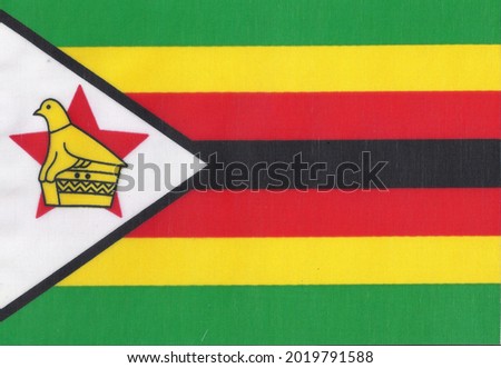 National flag of the country of zimbabwe shown close up
