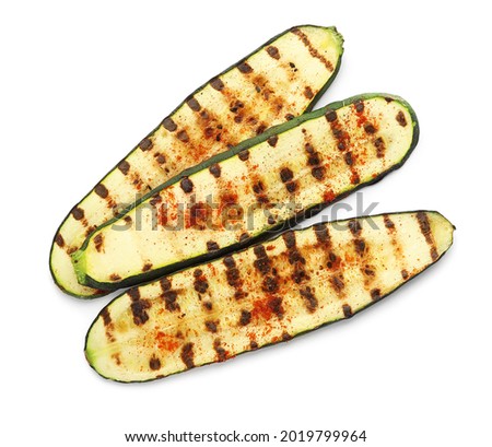 Tasty grilled zucchini on white background Royalty-Free Stock Photo #2019799964