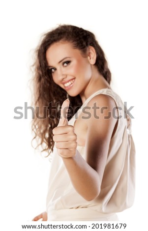 beautiful young girl showing thumb up
