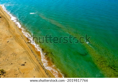 Aerial view of the beach on the Bugaz Spit in Anapa in Russia. Beach from the sea. Drone photo.