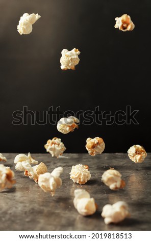Select focus picture white popcorn fall art style of corn is a delicious food or snack to eat in the cinema use it as a background image.