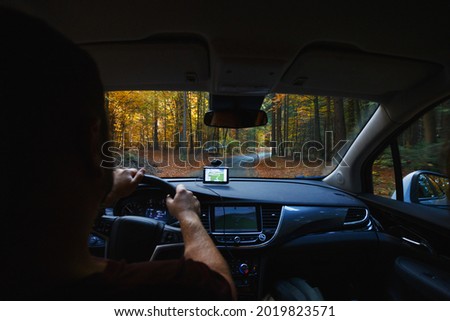 roadtrip - man hands on the wheel and mountains.  Alps, Austria
 Royalty-Free Stock Photo #2019823571