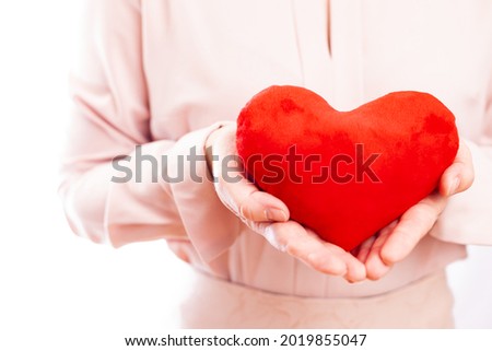 Woman's love, woman's heart, white background, concept