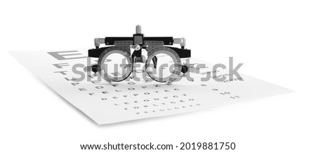 Eye chart test and trial frame on white background. Ophthalmologist tools Royalty-Free Stock Photo #2019881750