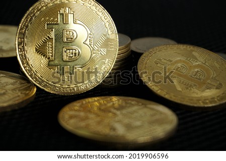 Bitcoin BTC Cryptocurrency Coins or digital money with black background