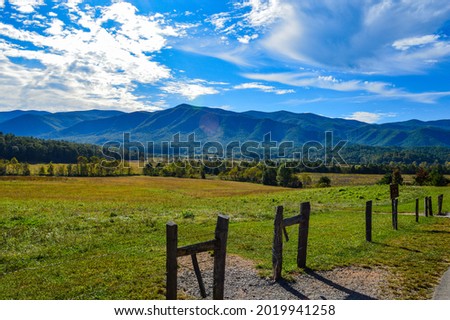 Cades Cove meadow and mountains Royalty-Free Stock Photo #2019941258