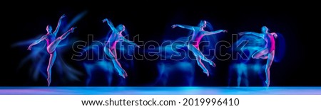 Development of movements of one beautiful ballerina dancing isolated on dark background in mixed neon light. Concept of art, beauty, aspiration, creativity. Action and motion Royalty-Free Stock Photo #2019996410