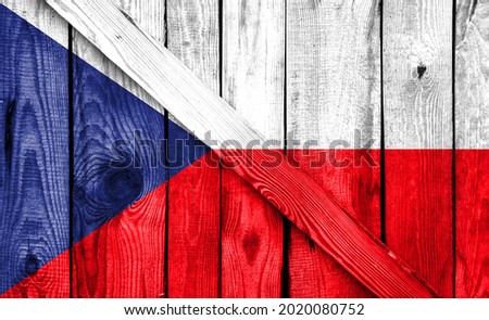 Czech Republic flag is depicted on a wooden background close-up