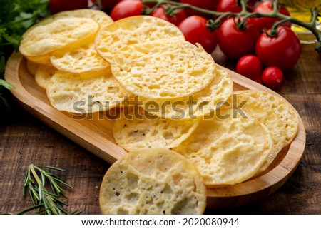 delicious strips of smoked and dehydrated provolone cheese Royalty-Free Stock Photo #2020080944