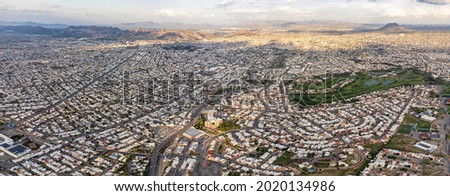 Aerial panorama of the city of Chihuahua, Mexico at sunset, seen from its west side.