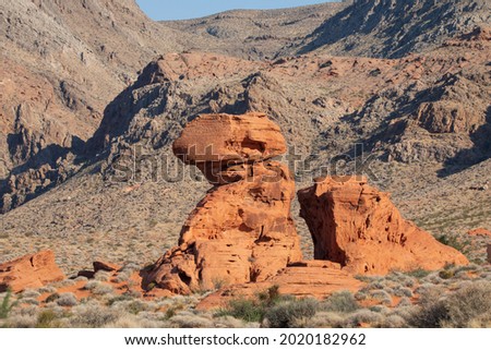 Red rocks of Valley of Fire in Nevada. Red stone hills with desert background.  