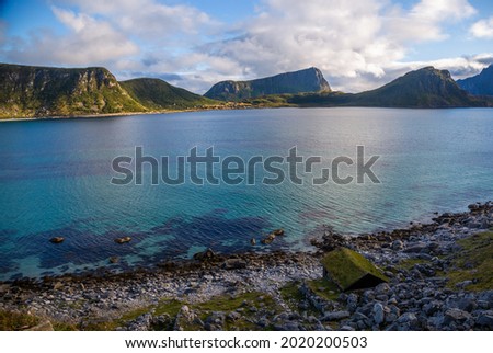 View on beach, house, ocean and mountains, Lofoten, Norway