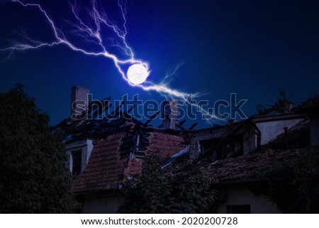 lightning ball damaged the roof of the house
