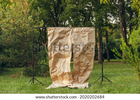 cardboard background for a photo shoot in the park in summer