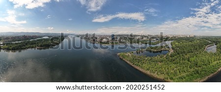 View of the city center, suspension bridge over the river, aerial photography