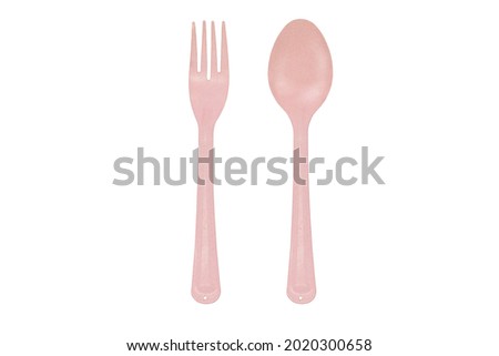 pink spoon and fork isolate on white background