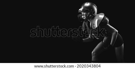 Portrait of a girl in the uniform of an American football team player. Black background. Sports concept. Mixed media