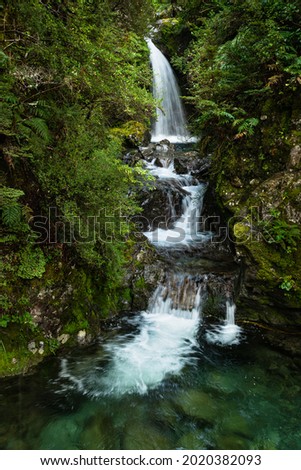 Avalanche Creek Waterfall in the rain, Arthur's Pass, South Island. Vertical format