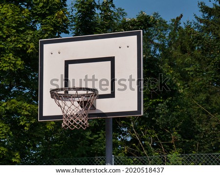 front view of a basketball hoop with backboard