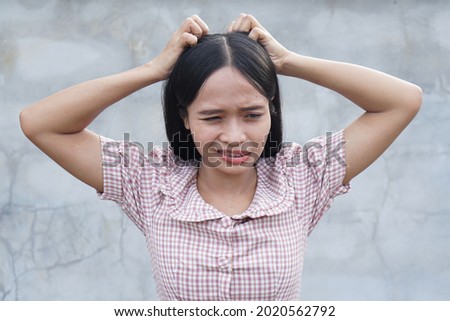 Asian women itchy scalp, dandruff