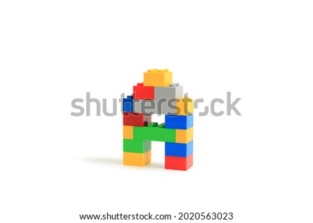 Alphabet letters A from colorful plastic brick block constructor isolated on white background. Image with Clipping path