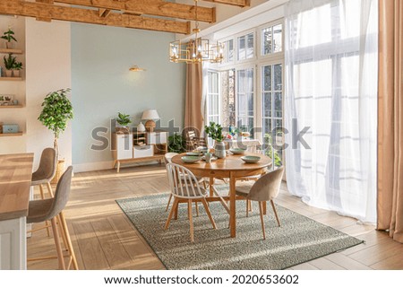 modern expensive luxurious open-plan apartment. Rich Scandinavian-style interior with wooden beams on the ceiling in pastel colors Royalty-Free Stock Photo #2020653602