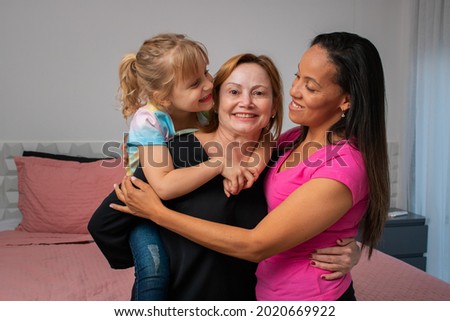 LGBT Diversity Lesbian Couple Moments Happiness with their daughter. Family concept