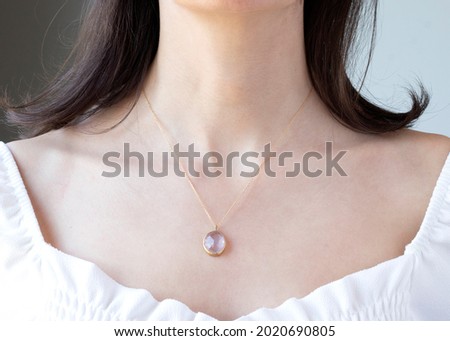 lose up beautiful woman neck with gold jewelry, Exclusive jewelry design, Beauty and fashion accessories Royalty-Free Stock Photo #2020690805